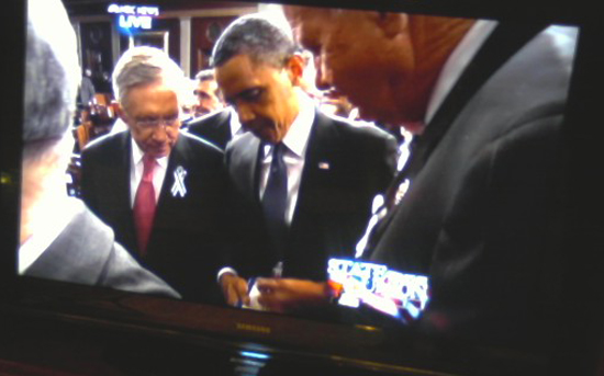 Barack Obama Signing Autos 3 Baarck Obama Signs additonal autographs following his State of the Union Address.
