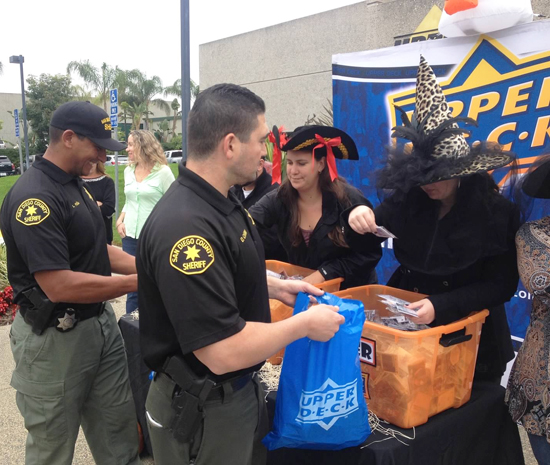 Upper-Deck-Trick-or-Trade-Halloween-Police-Officers-Pick-Up-Packs-at-Headquarters